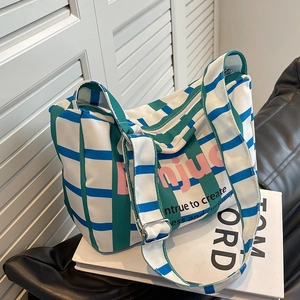 Plaid canvas shoulder bag with pink Bonjour print and adjustable wide strap