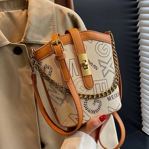 Off-white bucket bag with geometric patterns, leather trim and gold chain detail