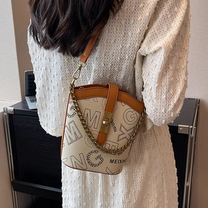 Retro letter print bucket bag in beige and brown leather with chain strap for women