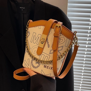 Fashion canvas bucket bag with leopard print and leather strap in retro style