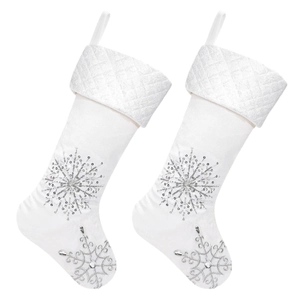 Pair of white satin Christmas stockings with silver glitter snowflakes and hanging loops