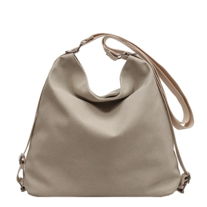 Minimalist khaki canvas hobo bag with adjustable shoulder strap for daily commuting