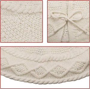 White cable knit Christmas tree skirt with decorative bow ties and soft texture
