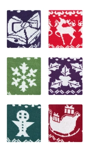Detailed view of six knit Christmas patterns including reindeer and snowflakes on festive socks