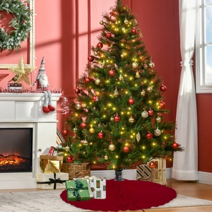 Nahaufnahme eines beleuchteten Weihnachtsbaums mit LED-Licht und rotem Baumrock