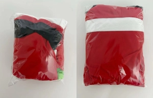 Detail view of red Christmas plush textile items packed in transparent plastic bags