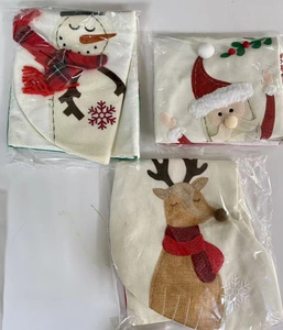 Christmas table runner set with embroidered snowman and Santa in plastic packaging