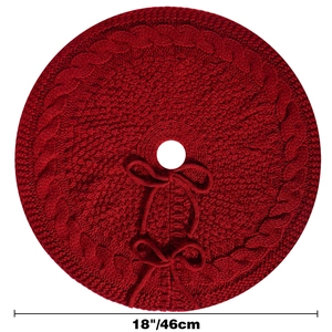 Detail of 18 inch red cable knit Christmas tree skirt with bow tie closures