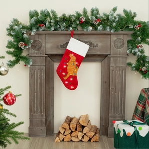 Close-up of a festive red Golden Retriever Christmas stocking with glowing LED lights