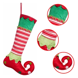 Detail of Christmas elf socks showing velvet fabric, striped knits and curly boot design