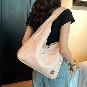 Nude pebbled leather large shoulder tote bag with wide strap and front metal magnetic pocket