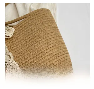 Macro shot of the beige straw woven texture featuring delicate white lace bow details
