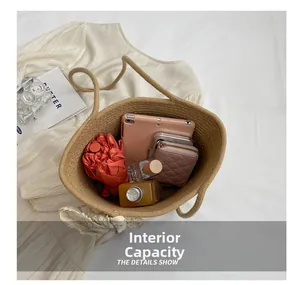Interior view of the woven tote bag showing ample space for tablets and umbrellas