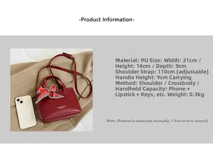 Detail view of red PU handbag with fashion text and silk bow showing 21x14x9cm dimensions
