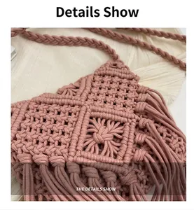 Detail of woven straw shoulder bag featuring textured knit patterns and long side tassels
