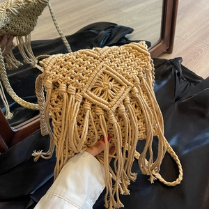 Bohemian handmade straw crossbody bag with elegant tassels and diamond woven pattern