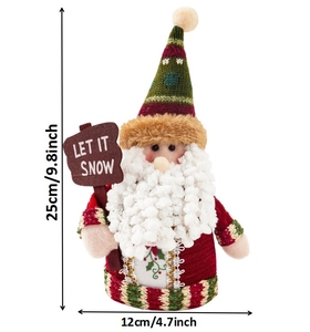 Plush Christmas gnome holding Let It Snow sign measuring 25cm high and 12cm wide