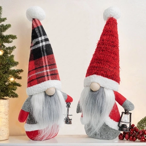Christmas gnomes with red knit hats and tiny lanterns set against holiday pine decor