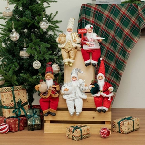 Five assorted 12-inch sitting Santa Claus figurines for festive indoor Christmas decor