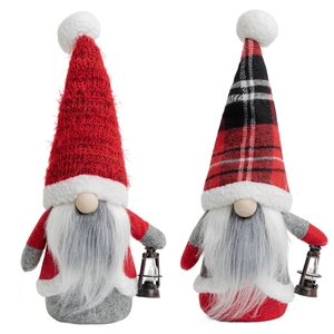 Set of two Christmas gnomes with knit red hats, white beards and vintage lanterns