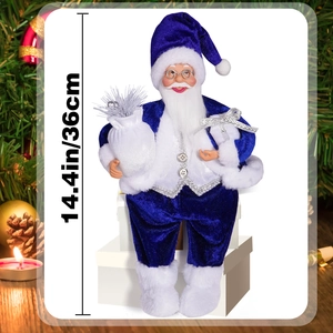 Detailed view of a 14.4-inch Santa Claus plush in blue velvet outfit with gift bag accessory