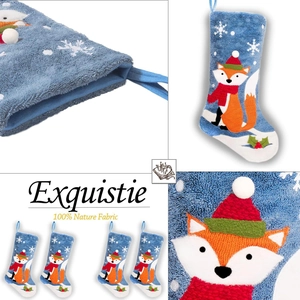 Set of four blue plush Christmas stockings with cute fox embroidery and white snowflakes
