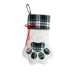 White faux fur pet Christmas stocking with green plaid trim and red ribbon bow accent
