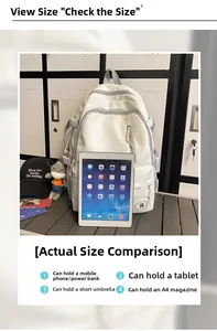 Detailed internal capacity showing space for a tablet, phone, and A4 size magazines