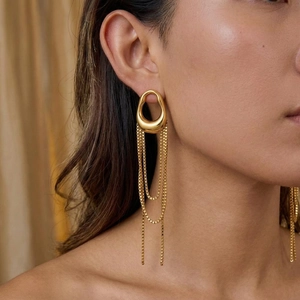 Elegant French retro gold geometric tassel drop earrings worn by a model in lifestyle shot