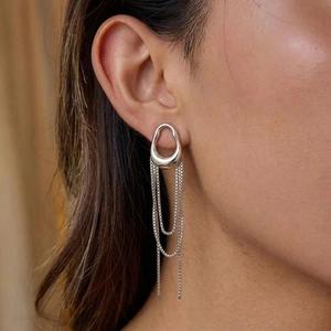 Elegant French vintage geometric silver earrings with delicate chain tassels shown on model