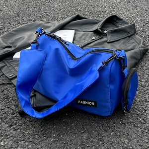 Large capacity Klein blue nylon crossbody bag with mini pouch and fashion logo on street