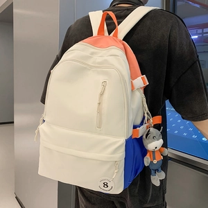 Large capacity color-block canvas backpack in cream and orange with grey donkey pendant