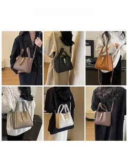 Sacs seau pour femmes en plusieurs couleurs avec cuir grainé et boucles dorées
