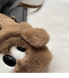 Detailed close-up of brown faux fur texture and cute cartoon eyes on small tote bag