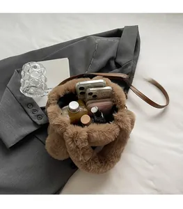 Spacious interior of brown fuzzy tote bag showing large capacity for daily items