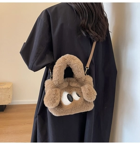 Model showing khaki plush dog-shaped crossbody bag with soft long faux fur and cute ears