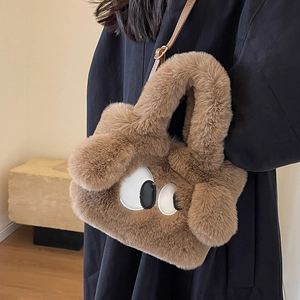 Brown fuzzy faux fur cartoon dog handbag with large eyes and leather shoulder strap