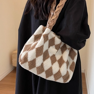Furry tote bag with brown and white diamond pattern and woven leather handles