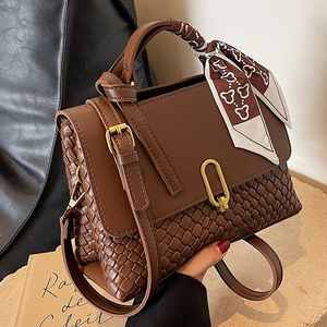 Brown woven leather handbag for women with silk scarf and gold oval buckle detail