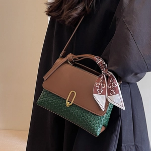 Vintage brown and green woven leather crossbody bag with silk scarf on handle