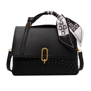 Classic black woven crossbody bag with gold buckle and decorative silk scarf detail
