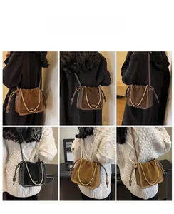 Multiple views of a matte suede drawstring bucket bag with chain strap worn by a model