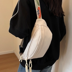 Chic beige canvas crossbody bag with vintage floral wide strap and woven zipper puller