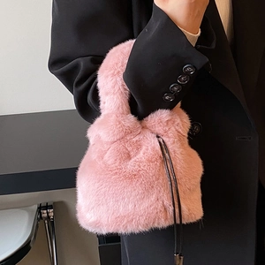Sac seau chic en fausse fourrure rose avec cordon pour la mode automne-hiver femme