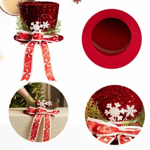 Red sequin Christmas tree topper hat with candy cane ribbon and snowflake details
