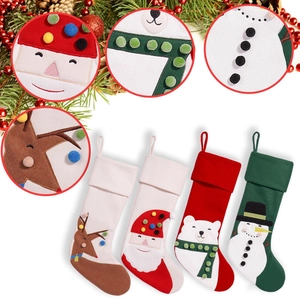 Set of four Christmas stockings with Santa, reindeer, polar bear, and snowman designs