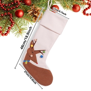 Detail of Christmas stocking with reindeer embroidery and colorful pompoms, 48cm size