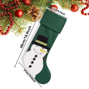 Detail view of a 48cm green Christmas stocking with a white snowman appliqué and dimensions
