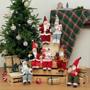 Festive 12-inch sitting Santa Claus dolls in classic red and black plaid holiday outfits