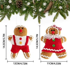 Paar pluche peperkoekman en vrouw ornamenten voor kerstboom versiering